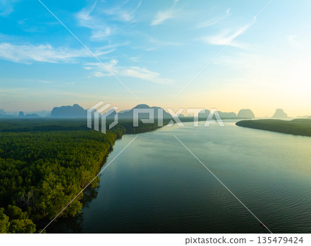 Aerial view sunset sky,Nature beautiful light Sunset or sunrise over sea,Colorful scenery sunset sky background,Amazing clouds and waves in sunrise sky nature light cloud background Aerial view sunset sky,Nature beautiful light Sunset or sunrise over sea,Colorful scenery sunset sky background,Amazing clouds and waves in sunrise sky nature light cloud background 135479424