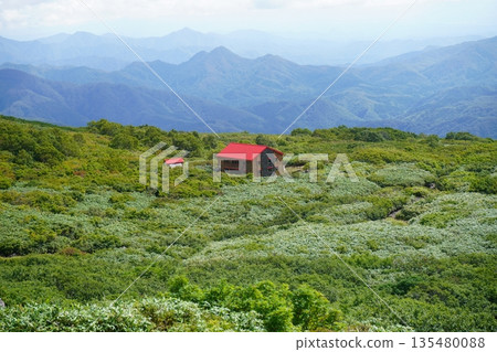 Mount Chokai and waterfall hut in summer Mount Chokai and waterfall hut in summer 135480088