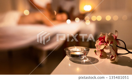 Spa Composition With Aromatic Candle And Exotic Orchid Flowers. Unrecognizable Couple Receiving Relaxing Massage At Spa. Beauty, Wellness And Relaxation. Selective Focus, Panorama With Copy Space Spa Composition With Aromatic Candle And Exotic Orchid Flowers. Unrecognizable Couple Receiving Relaxing Massage At Spa. Beauty, Wellness And Relaxation. Selective Focus, Panorama With Copy Space 135481051