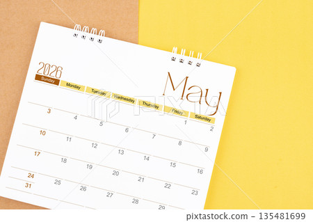 May 2026 desk calendar on brown and yellow, Planning for business. May 2026 desk calendar on brown and yellow, Planning for business. 135481699