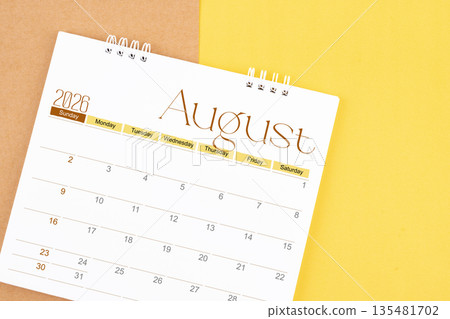 August 2026 desk calendar on brown and yellow, Planning for business. 135481702
