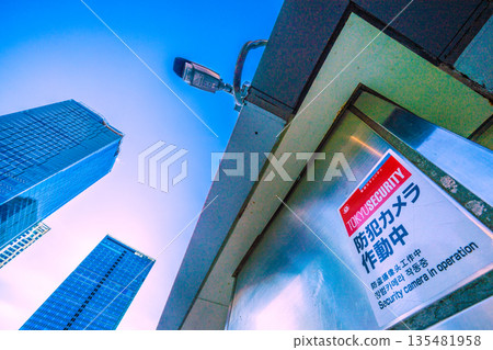 Tokyo cityscape in Japan: View of street corner security cameras from in front of Shibuya Scramble Crossing 135481958