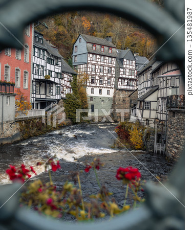 Picturesque Town Monschau with Historical Charm and the Tranquil Rur River in autumn Picturesque Town Monschau with Historical Charm and the Tranquil Rur River in autumn 135481987