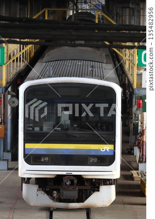 Chiba-area 209 series train undergoing inspection at the Omiya General Rolling Stock Center (Omiya Ward, Saitama City, Saitama Prefecture) Chiba-area 209 series train undergoing inspection at the Omiya General Rolling Stock Center (Omiya Ward, Saitama City, Saitama Prefecture) 135482956