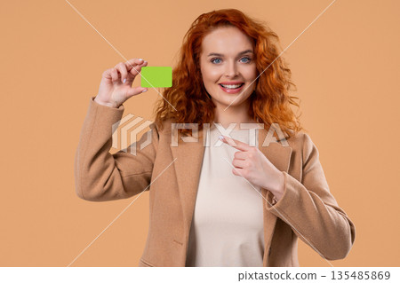 Successful Manager Woman Showing Unlimited Green Credit Card, Pay and Buy. Mock-up 135485869