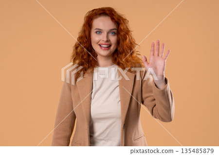Friendly Young Ginger BusinessWoman Waving Hand - Hello, Or Salute, Chao 135485879