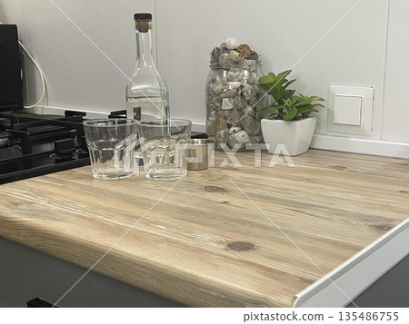 vodka with glasses on the holiday table 135486755