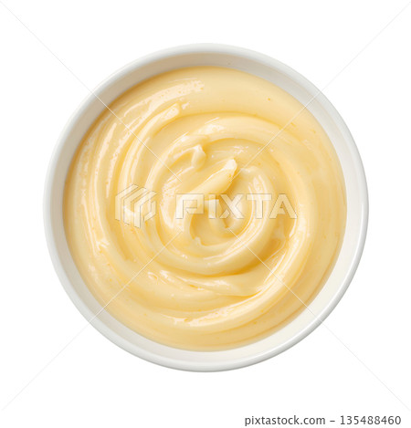 Creamy Sauce in a Round White Bowl on a Plain Surface Ready for Serving With Food 135488460