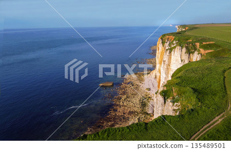 Steep cliffes omn Normandian coast of France 135489501