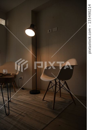 Cozy living room creating relaxing mood with warm lighting 135490214