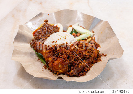 Authentic Malaysian cuisine Nasi Lemak Ayam Goreng Authentic Malaysian cuisine Nasi Lemak Ayam Goreng 135490452
