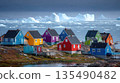 Colorful Arctic Village on Rocky Shore with Icebergs 135490482