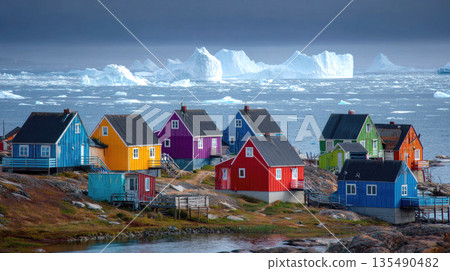 Colorful Arctic Village on Rocky Shore with Icebergs 135490482