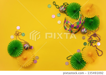 Mardi gras mask beads coins festive carnival celebration 135491092