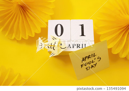 April 1st date and paper fish celebrating fool's day April 1st date and paper fish celebrating fool's day 135491094