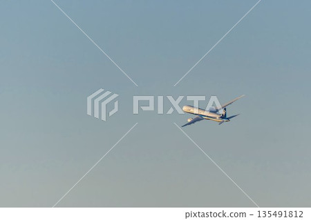 Osaka Airport (Itami Airport) in the evening. A plane taking off. Toyonaka City, Osaka Prefecture. 135491812