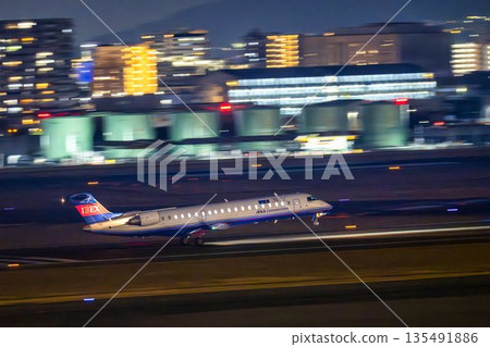 Night view of Osaka Airport (Itami Airport) - Plane taking off, Toyonaka City, Osaka Prefecture Night view of Osaka Airport (Itami Airport) - Plane taking off, Toyonaka City, Osaka Prefecture 135491886