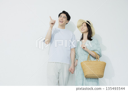 A young woman wearing a light blue dress A young woman wearing a light blue dress 135493544