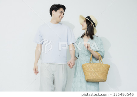 A young woman wearing a light blue dress A young woman wearing a light blue dress 135493546