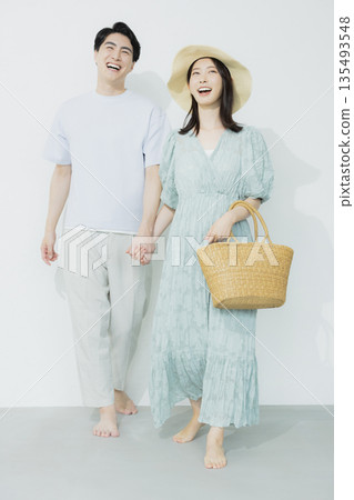 A young woman wearing a light blue dress A young woman wearing a light blue dress 135493548