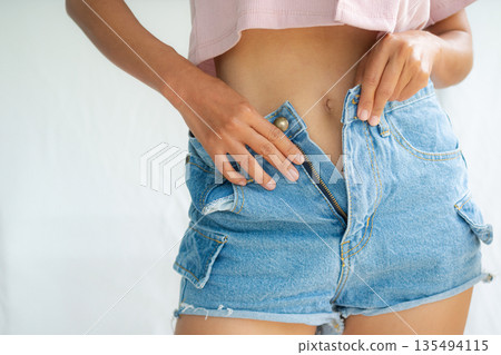 Slim Fit Body Woman Close up, Shapely Beauty Perfect non Fat and Cellulite, Thin Young Healthy from Diet Gym Exercise Massage Treament and Control Weige Health Care Lifestyle, Skin Tan Model Female. Slim Fit Body Woman Close up, Shapely Beauty Perfect non Fat and Cellulite, Thin Young Healthy from Diet Gym Exercise Massage Treament and Control Weige Health Care Lifestyle, Skin Tan Model Female. 135494115