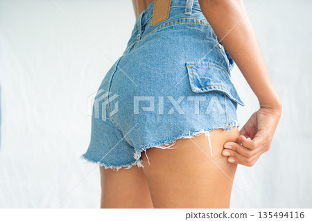 Liposuction Pushing Leg Woman, Skin Fat Layer Body of Slim Girl, Skin tan and Shapely Close up Sport Cellulite Concept for Diet Nutrition Fitnet Lifestyle Massage, Over Weight. Liposuction Pushing Leg Woman, Skin Fat Layer Body of Slim Girl, Skin tan and Shapely Close up Sport Cellulite Concept for Diet Nutrition Fitnet Lifestyle Massage, Over Weight. 135494116