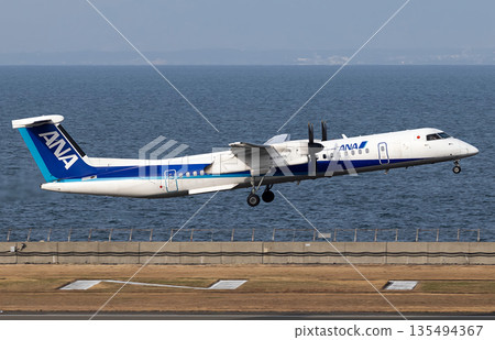 ANA Bombardier DHC 8 takes off from Haneda Airport 135494367