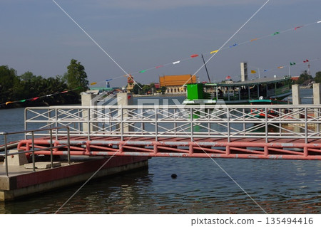 Bridge over the Maeklong River in Bangkok, Thailand Bridge over the Maeklong River in Bangkok, Thailand 135494416