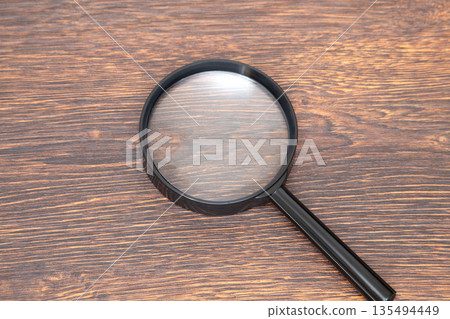Magnifying glass Magnifying glass 135494449