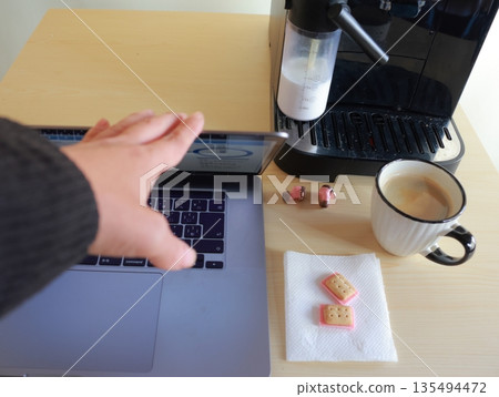 Coffee break during remote work (closing your computer) Coffee break during remote work (closing your computer) 135494472