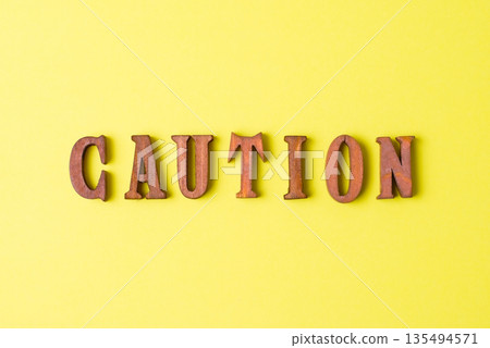 Yellow warning text image Yellow warning text image 135494571