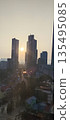 sunset over city 135495085