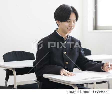 Male high school student studying 135495342