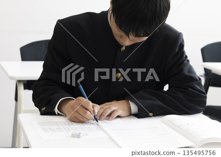 High school boys taking the exam High school boys taking the exam 135495756