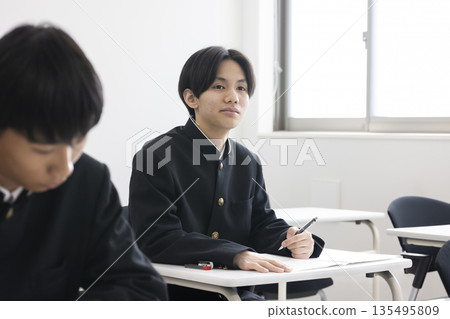 Boys studying to study 135495809