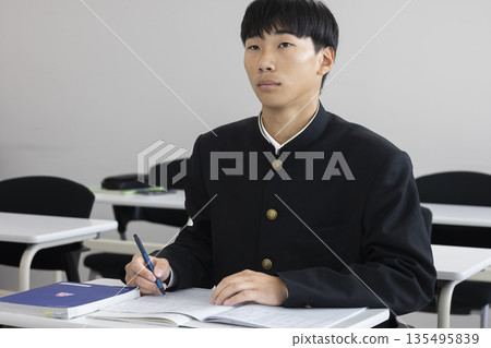 High school boys taking the exam 135495839