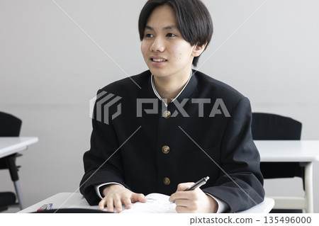 Male high school student studying 135496000