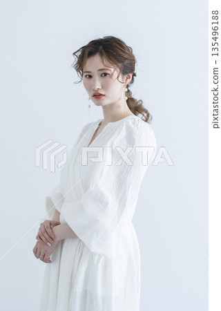 Young woman wearing a refreshing dress Young woman wearing a refreshing dress 135496188