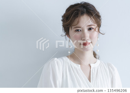 Young woman wearing a refreshing dress Young woman wearing a refreshing dress 135496206