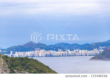 Copacabana Beach Tropical Paradise and City Skyline Rio de Janeiro Brazil. 135496588