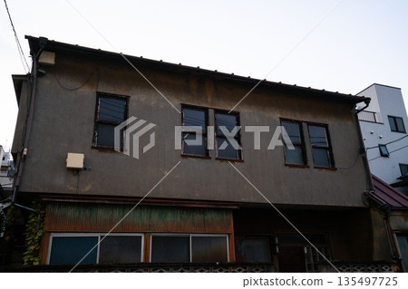 An old mortar-built two-story Showa-era building An old mortar-built two-story Showa-era building 135497725