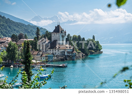 Picturesque Spiez Castle on Lake Thun, Switzerland A Fairytale Landscape for Travel Inspiration Picturesque Spiez Castle on Lake Thun, Switzerland A Fairytale Landscape for Travel Inspiration 135498051