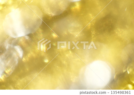 Abstract yellow and white bokeh background with light reflections and soft 135498361