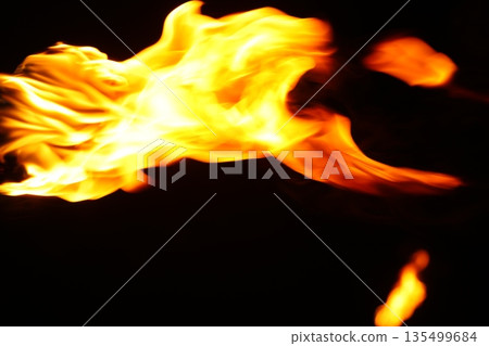 Glowing Fire Torch in the Night Glowing Fire Torch in the Night 135499684
