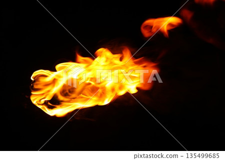 Glowing Fire Torch in the Night Glowing Fire Torch in the Night 135499685
