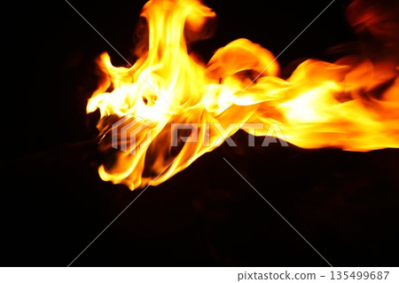 Glowing Fire Torch in the Night Glowing Fire Torch in the Night 135499687
