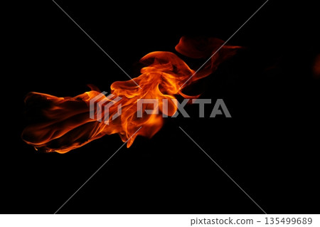 Glowing Fire Torch in the Night 135499689