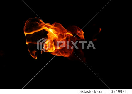 Glowing Fire Torch in the Night Glowing Fire Torch in the Night 135499713
