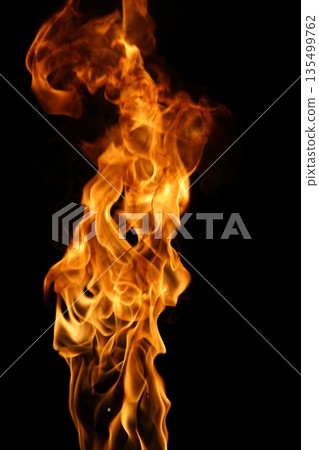 Glowing Fire Torch in the Night 135499762