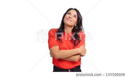 Happy dreamy woman looking up hugging herself 135500006